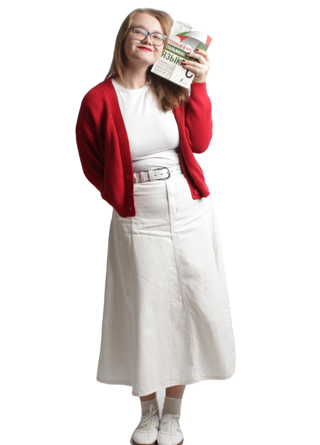 Viktoria Laskina smiling and holding an Italian coursebook beside her face.